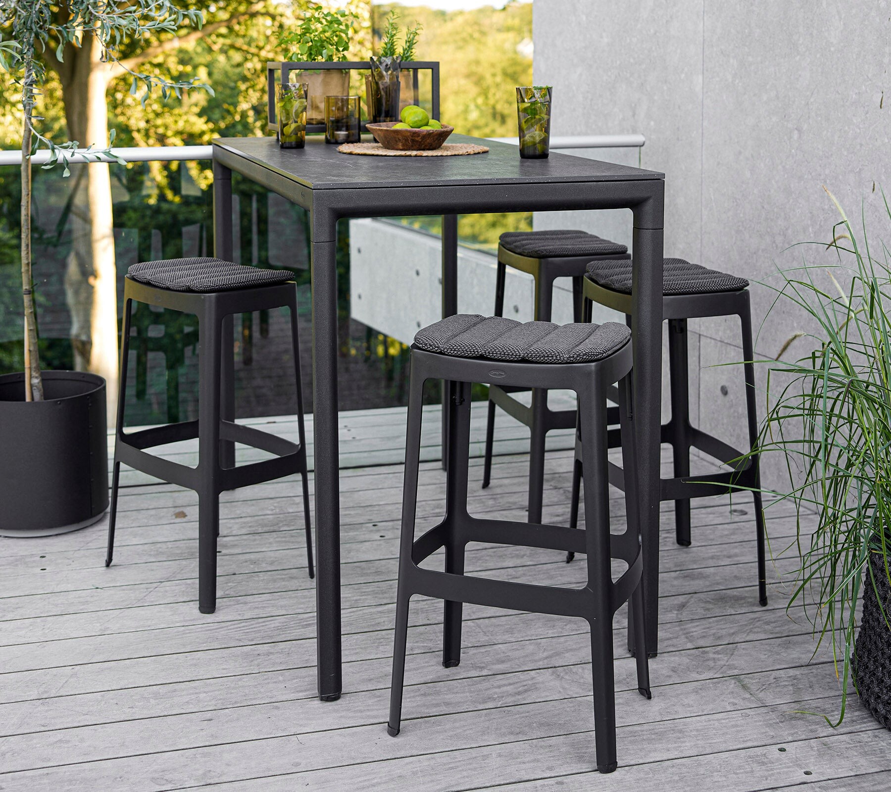 Cane-line Cut bar stool in lava grey aluminum